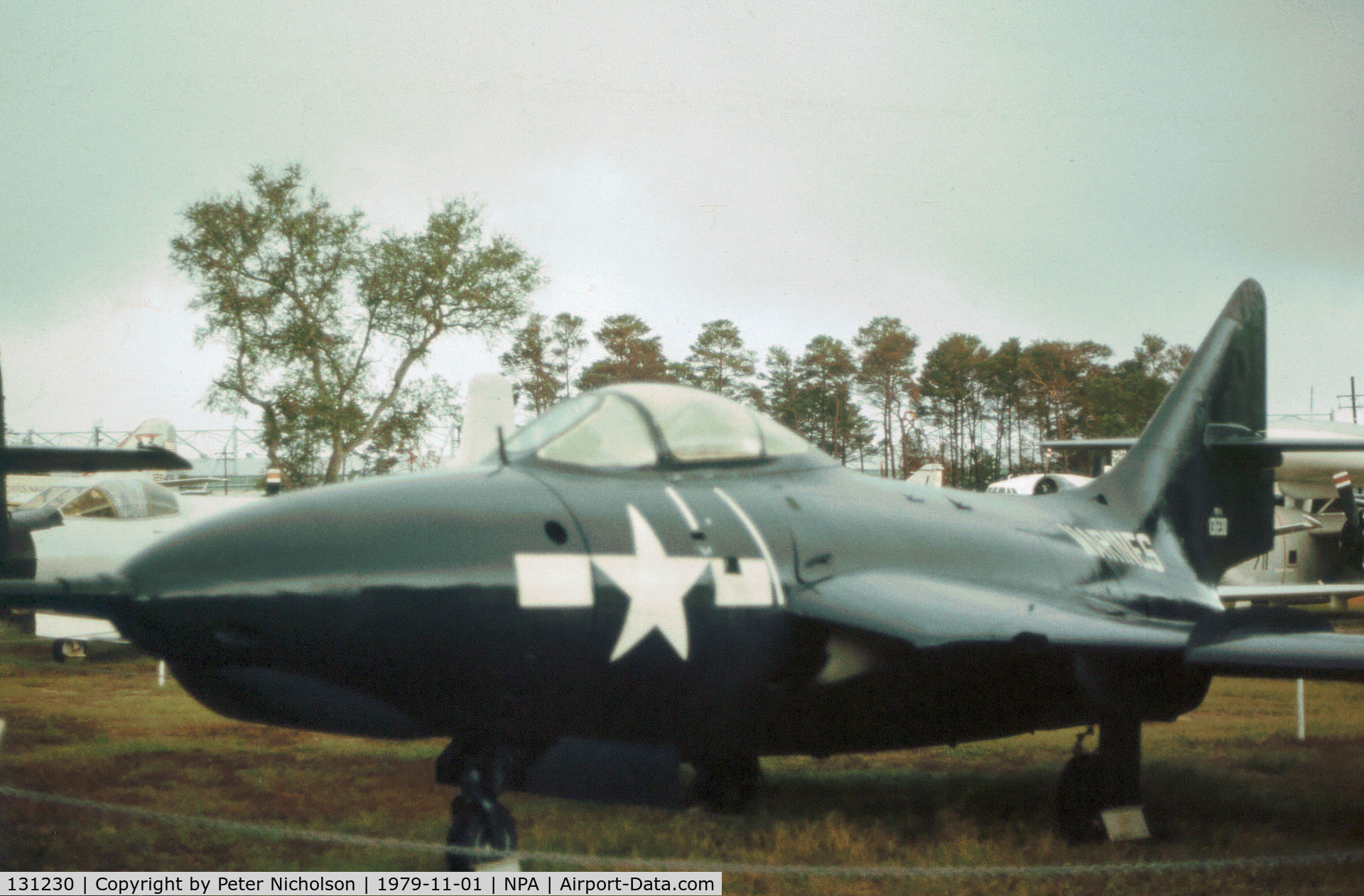131230, 1954 Grumman F9F-8 Cougar C/N 168C, F-9J Cougar as displayed at Pensacola Naval Museum in November 1979.