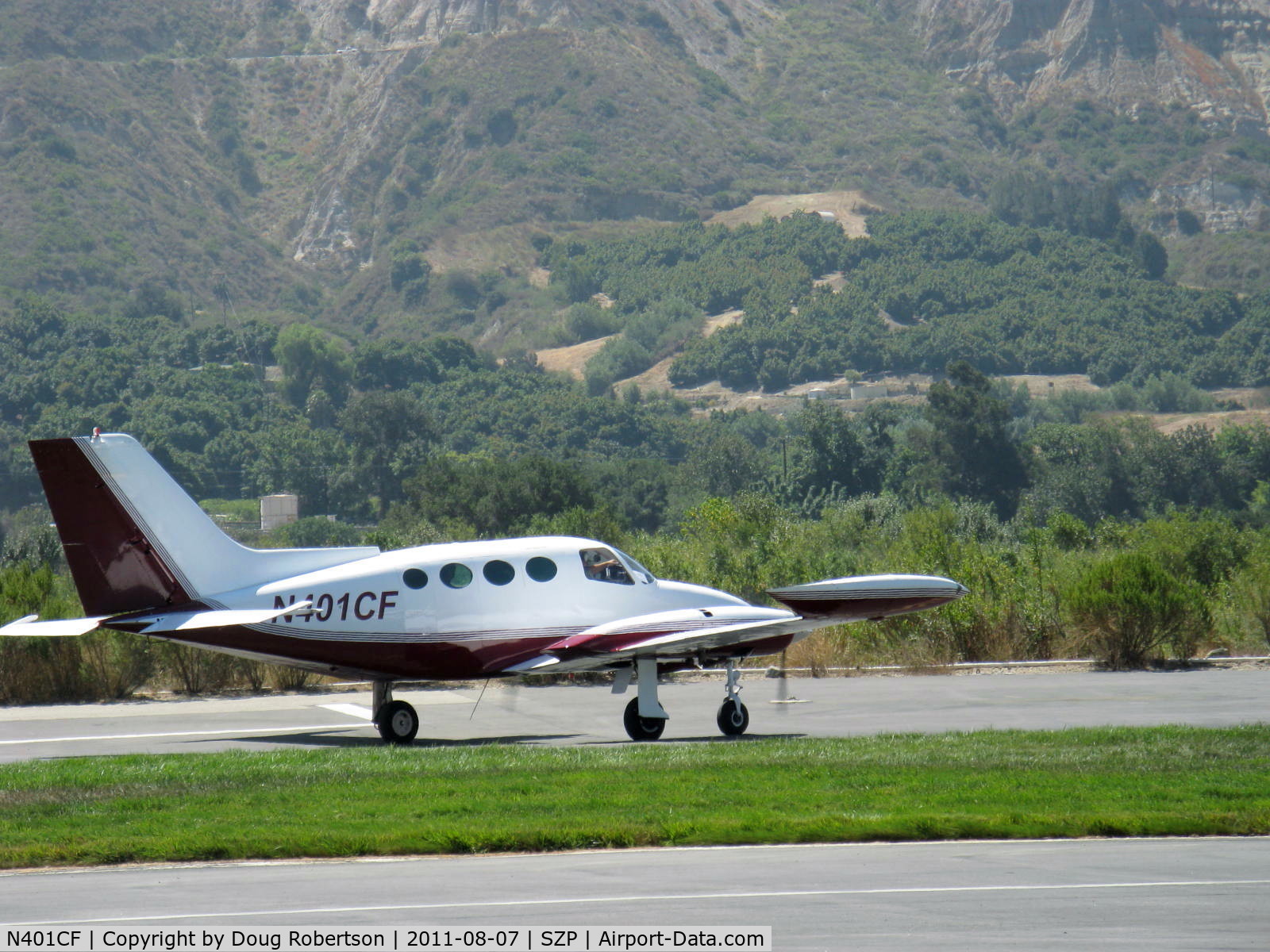 N401CF, 1967 Cessna 401 C/N 401-0115, 1967 Cessna 401, two Continental TSIO-520 Turbocharged 300 Hp each, taxi to transient parking