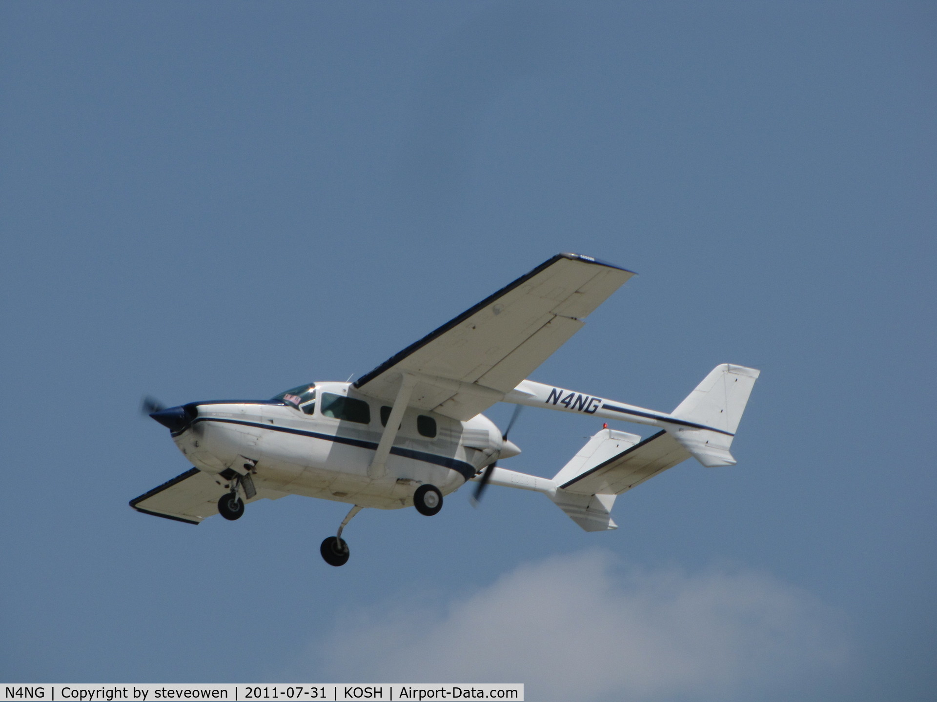 N4NG, Cessna 337 Super Skymaster C/N 337-01787, departing EAA 2011