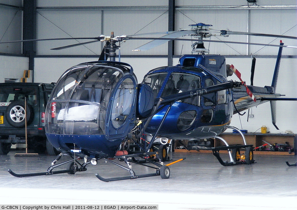 G-CBCN, 2001 Schweizer 269C-1 C/N 0129, at Newtonards Airport, Northern Ireland