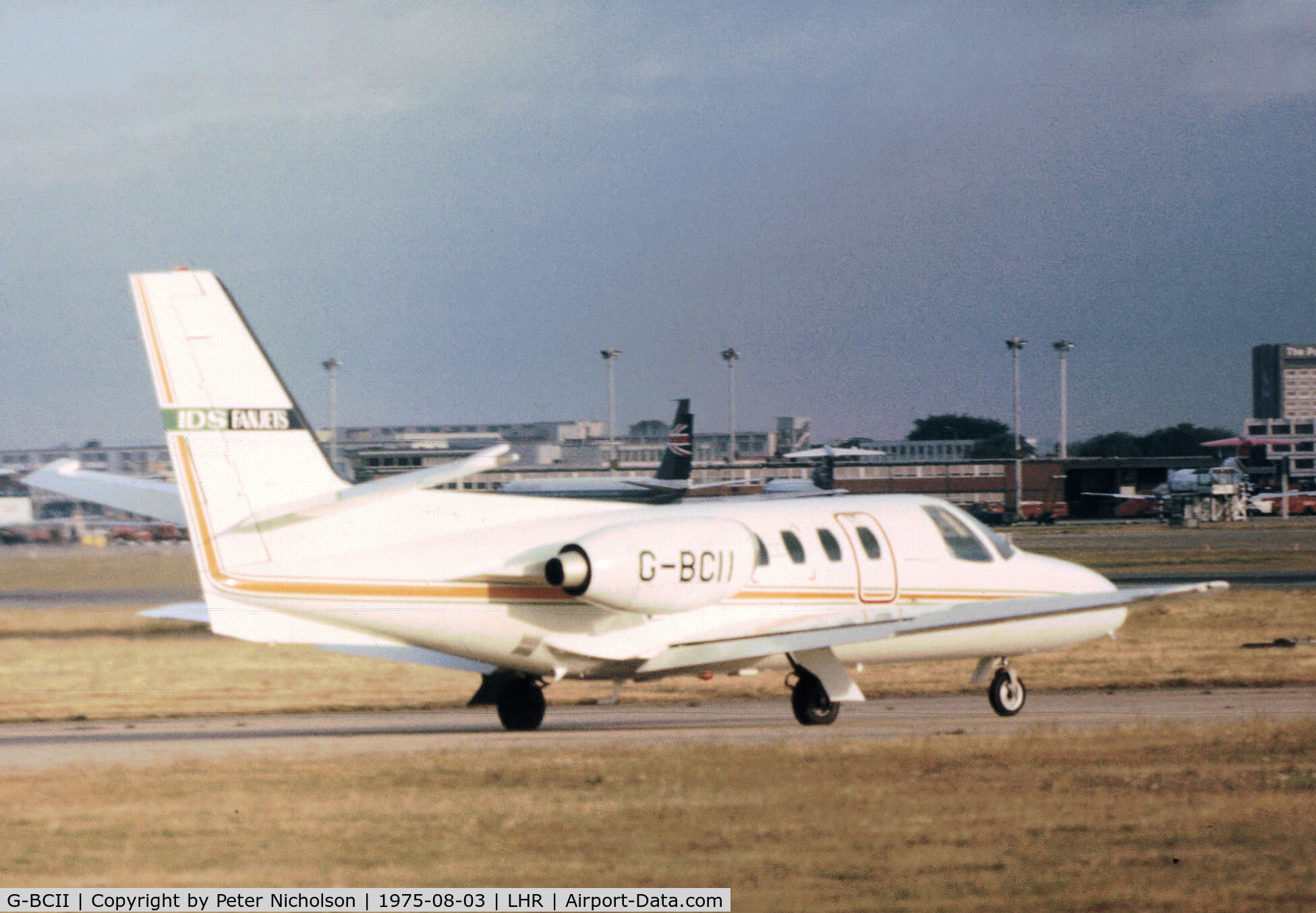 G-BCII, 1974 Cessna 500 Citation C/N 500-0176, Cessna 500 Citation of IDS Fanjets taxying at Heathrow in the Summer of 1975.