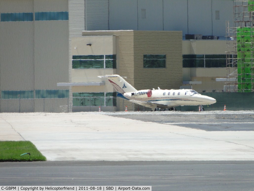 C-GBPM, 1998 Cessna 525 CitationJet C/N 525-0287, Parked to the rear of Million Air on a hot day