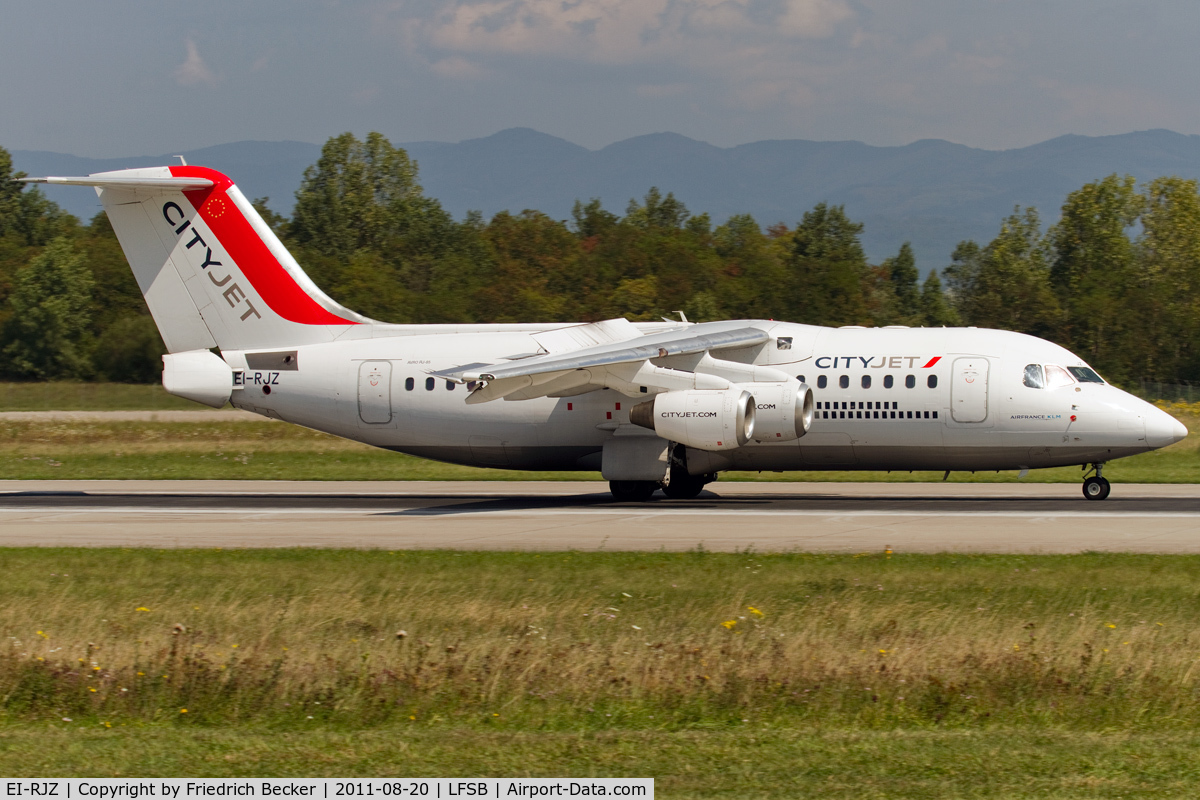 EI-RJZ, 1998 BAe Systems Avro 146-RJ85A C/N E.2326, decelerating after touchdown on RW15