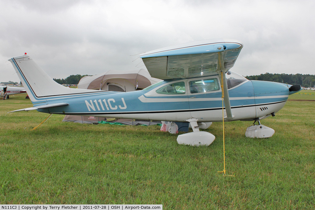 N111CJ, 1973 Cessna 182P Skylane C/N 18262621, Aircraft in the camping areas at 2011 Oshkosh