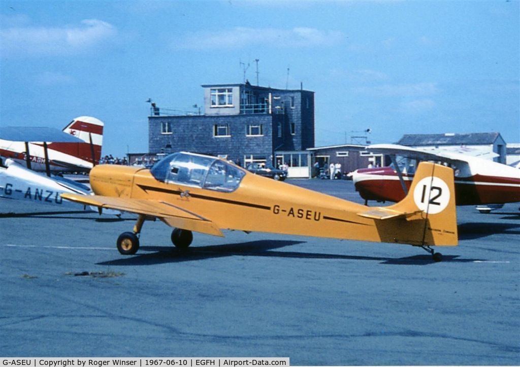 G-ASEU, 1963 Rollason Druine D-62A Condor C/N RAE/607, Condor carrying race # 12 attending the air show at Swansea Airport on 10th June 1967.