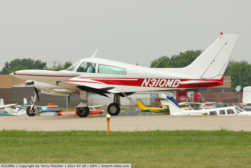 N310MG, 1976 Cessna T310R C/N 310R0724, At 2011 Oshkosh