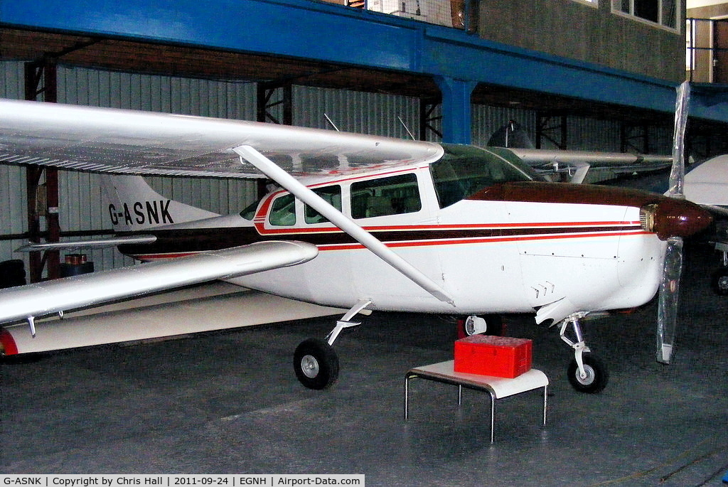G-ASNK, 1963 Cessna 210B C/N 205-0400, inside the packed Blackpool Air Centre hangar