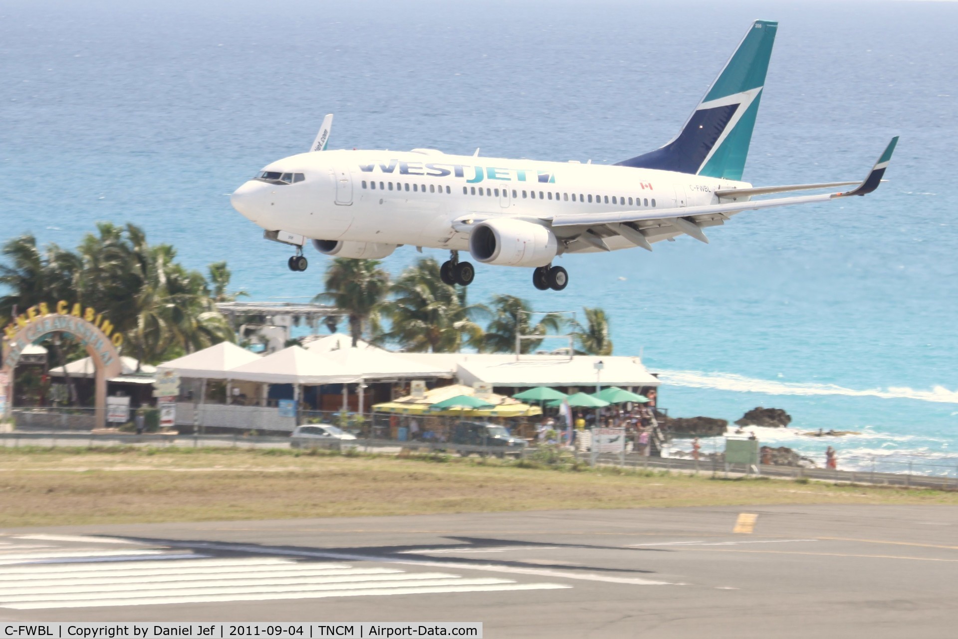 C-FWBL, 2003 Boeing 737-7CT C/N 32750, Canjet over Maho beach at TNCM