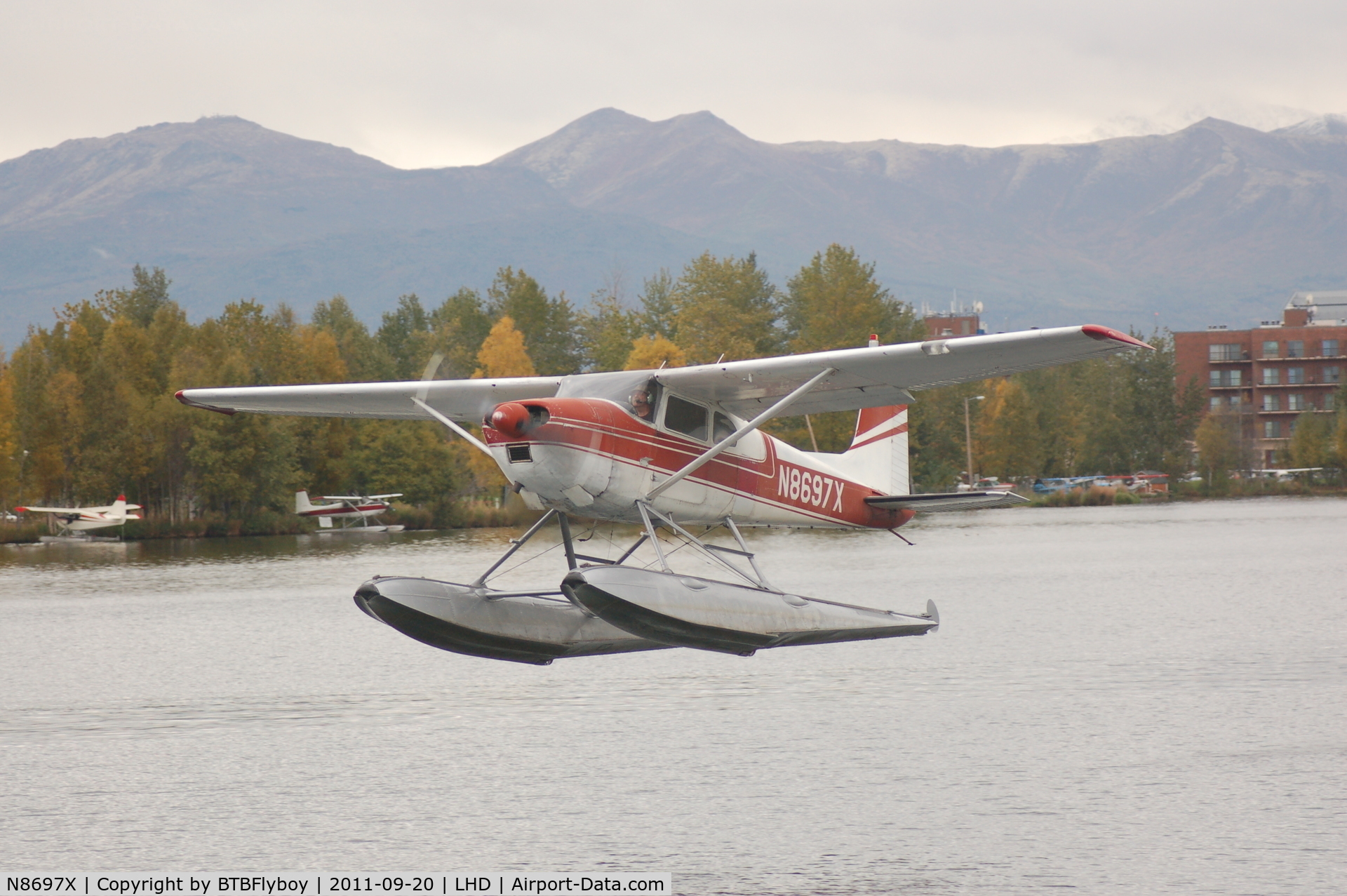 N8697X, 1962 Cessna 180E C/N 18051097, Departing from the Lake Spenard end of the Lake Hood Seaplane base Anchorage, AK