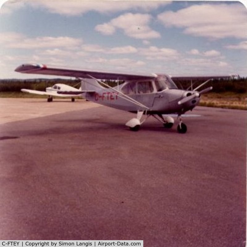 C-FTEY, 1958 Champion 7FC C/N 181, Photo taken at Forestville, Quebec, Canada in 1979. Was owner at the time. Flew 600 hours in it.