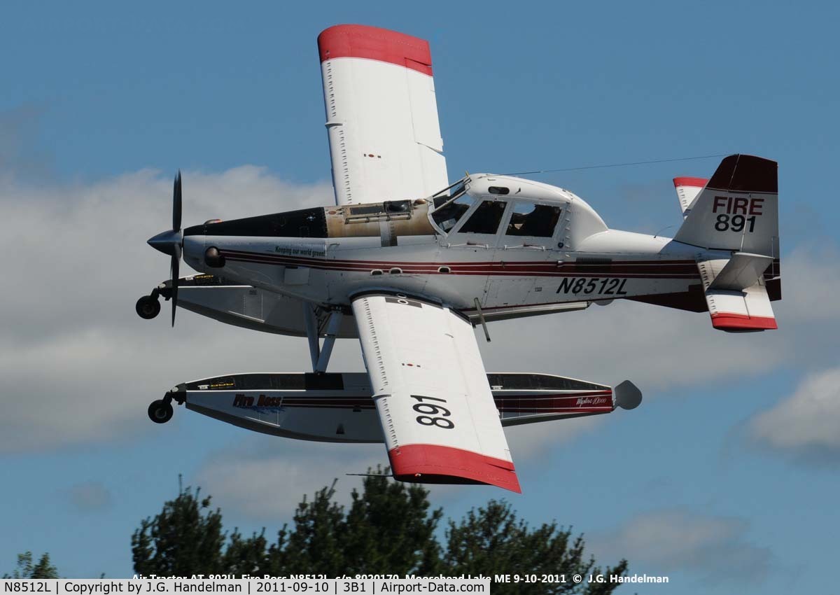 N8512L, 2004 Air Tractor Inc AT-802 C/N 802-0170, Banking over Moosehead Lake ME