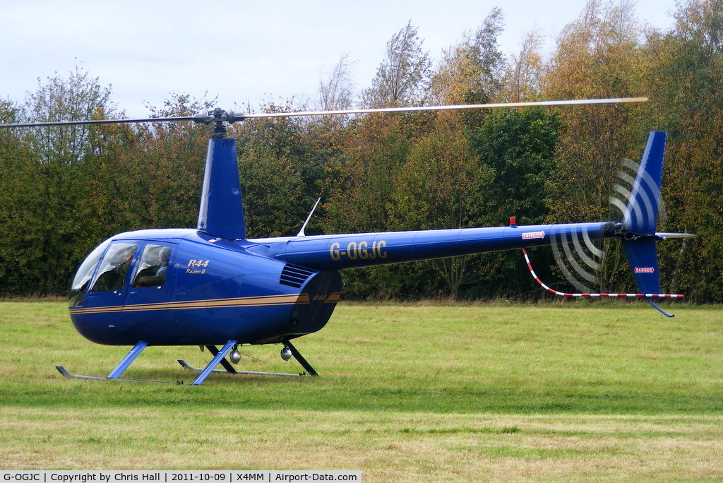 G-OGJC, 2009 Robinson R44 Raven II C/N 11653, At a fly-in at Manley Mere, Cheshire. Organised by Helicentre Liverpool in aid of the North West Air Ambulance