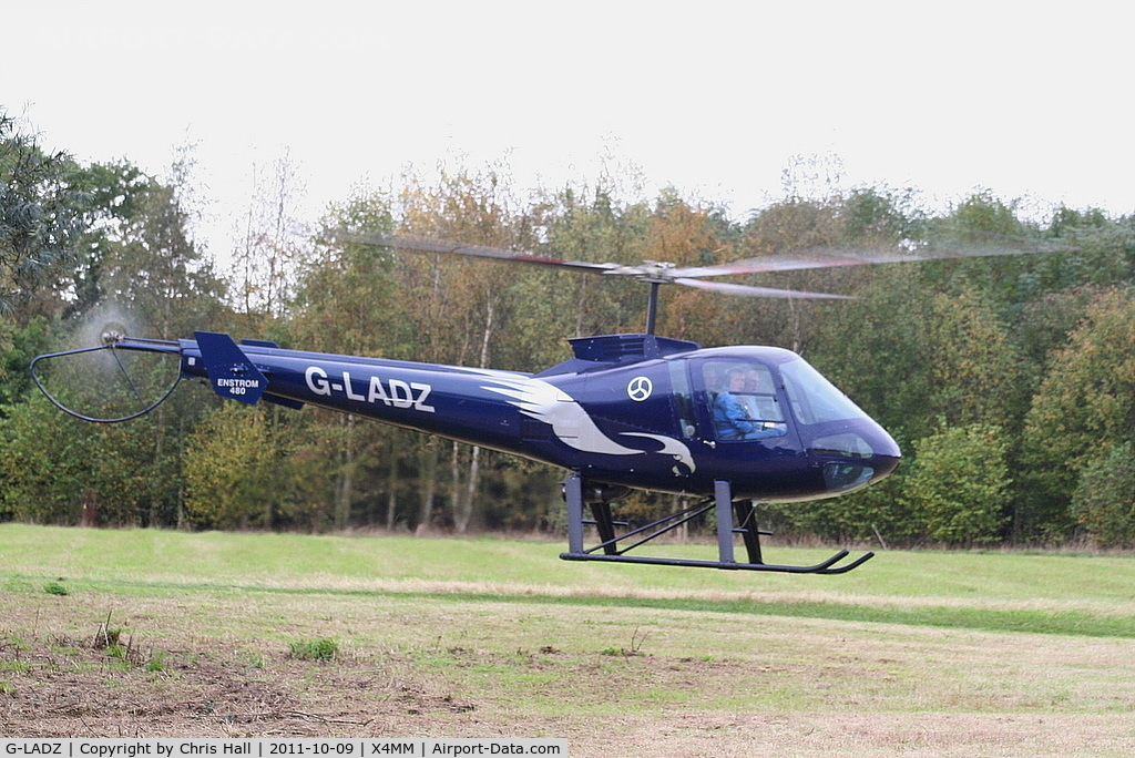 G-LADZ, 1993 Enstrom 480 C/N 5001, At a fly-in at Manley Mere, Cheshire. Organised by Helicentre Liverpool in aid of the North West Air Ambulance