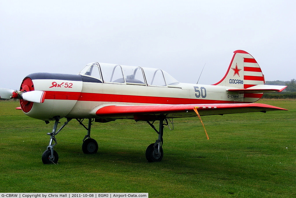 G-CBRW, 1991 Yakovlev (Aerostar) Yak-52 C/N 9111415, at Fullers Hill Farm, Little Gransden