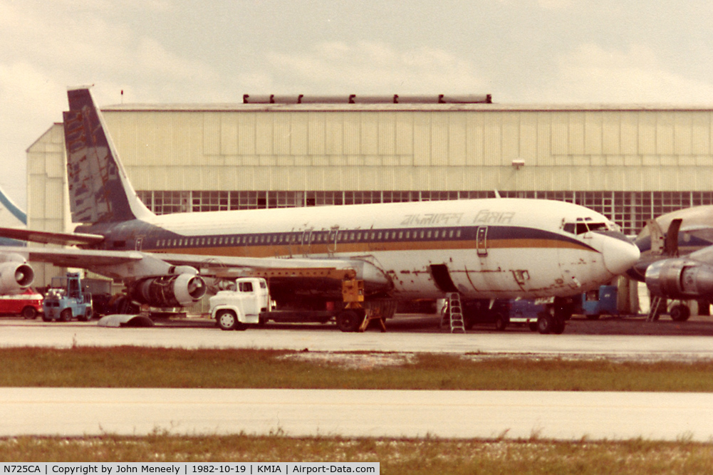 N725CA, 1959 Boeing 707-321 C/N 17603, Stored at KMIA. Faded Bangladesh Biman titles are visible on the upper fuselage.