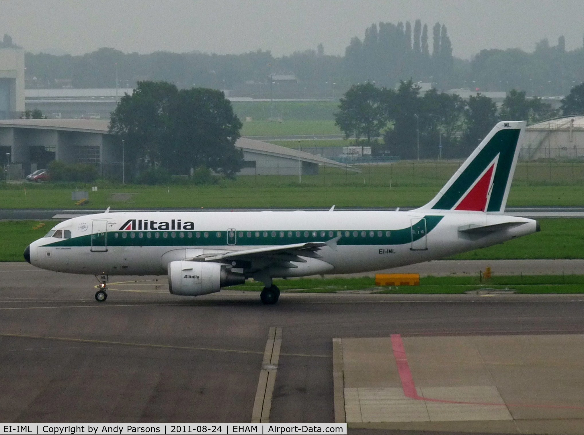 EI-IML, 2004 Airbus A319-112 C/N 2127, Taken at a very murky Amsterdam in August!!!