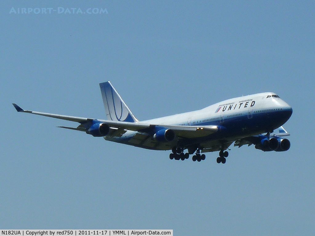 N182UA, 1991 Boeing 747-422 C/N 25279, United Airlines B747 approaching rwy 27 at MEL