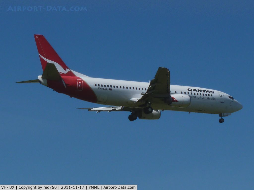 VH-TJX, 1995 Boeing 737-476 C/N 28150, Tango Juliet Xray approaching rwy 27 at MEL