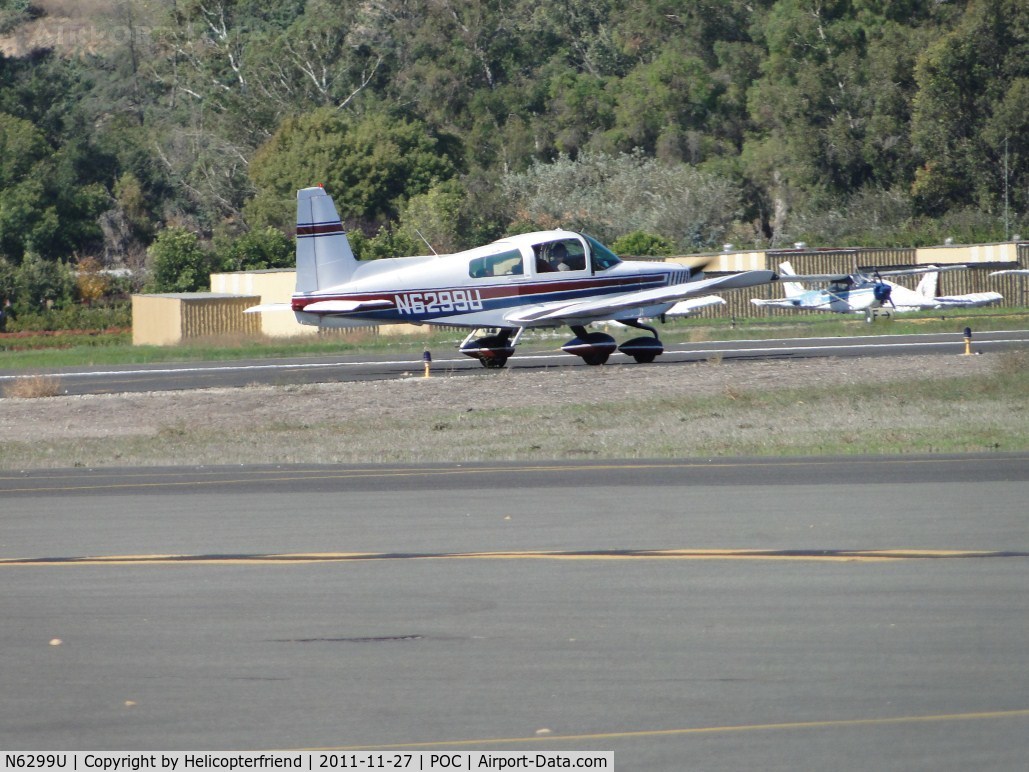 N6299U, 1975 Grumman American AA-5 Traveler C/N AA5-0782, Waiting for permission to cross runways enroute back to hanger