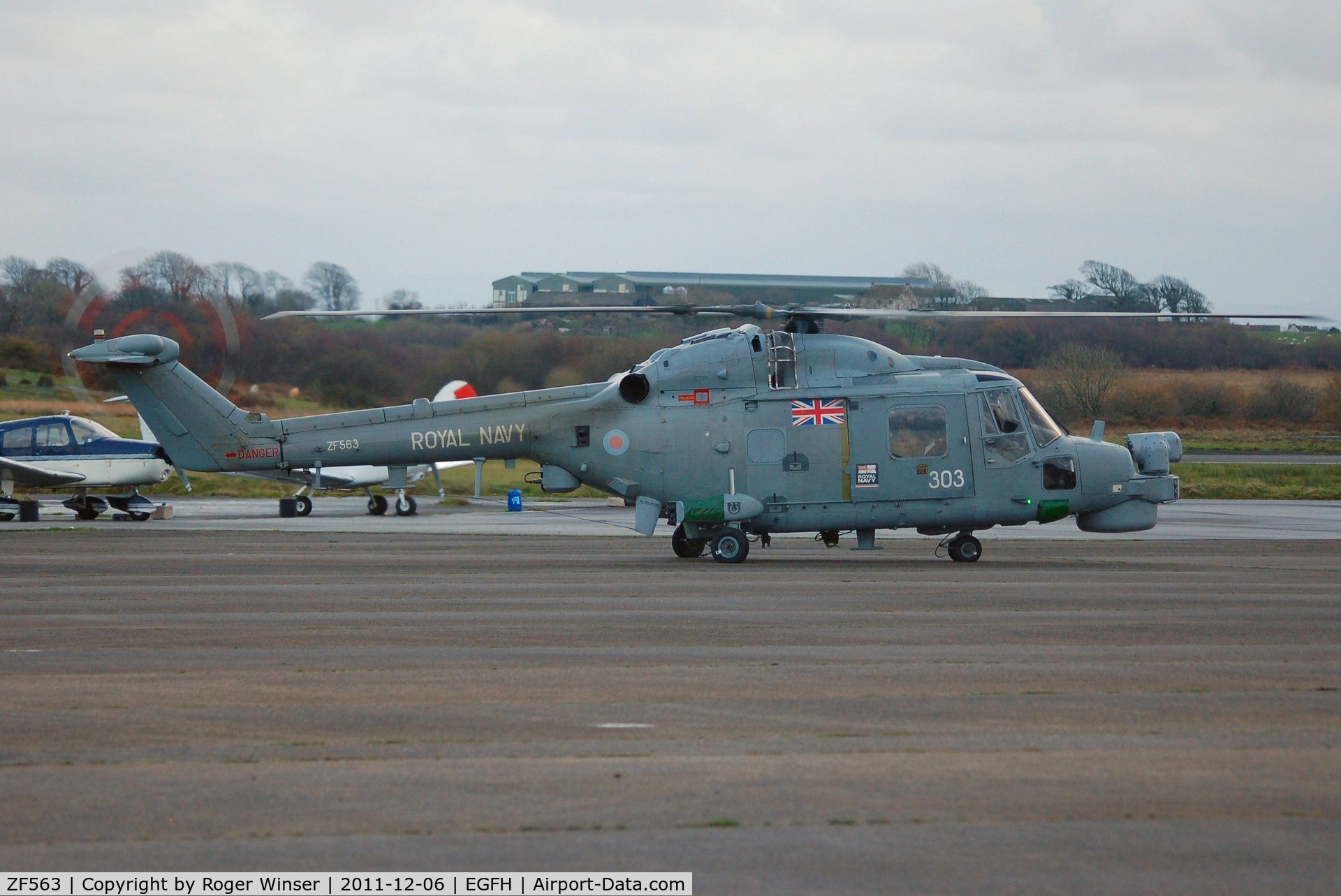 ZF563, 1988 Westland Lynx HMA.8SRU C/N 340, Coded 303 of 815 NAS. About to depart after taking on fuel.