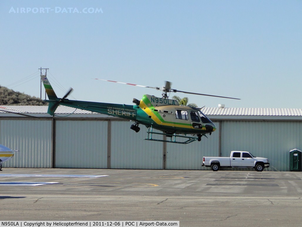 N950LA, 2010 Eurocopter AS-350B-2 Ecureuil Ecureuil C/N 4930, Air taxiing to taxiway Sierra or runway 26L for take off westbound