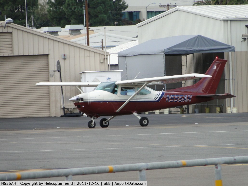 N555AH, 1977 Cessna 182Q Skylane C/N 18265573, Standing by at runway 35 while San Diego County Sheriff helicopter (N449RC) departs