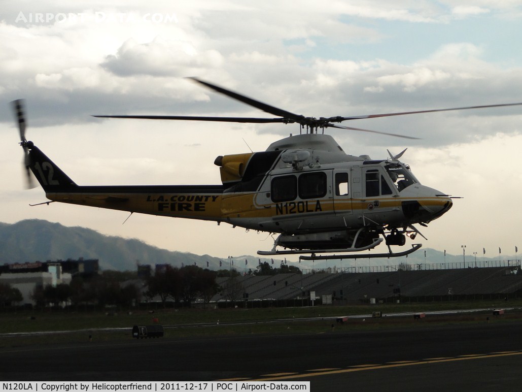 N120LA, 2007 Bell 412EP C/N 36455, Left turn, air taxi into helipad area and then turn around to face north