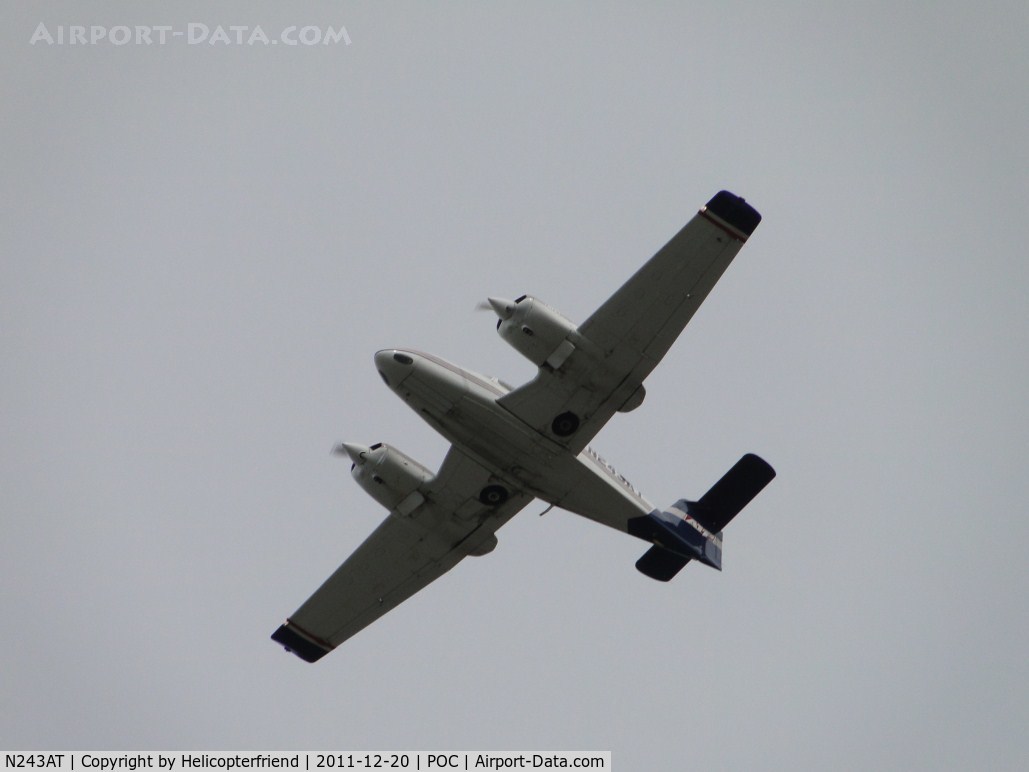 N243AT, 2000 Piper PA-44-180 Seminole C/N 4496042, High fly over pass to runway 26L