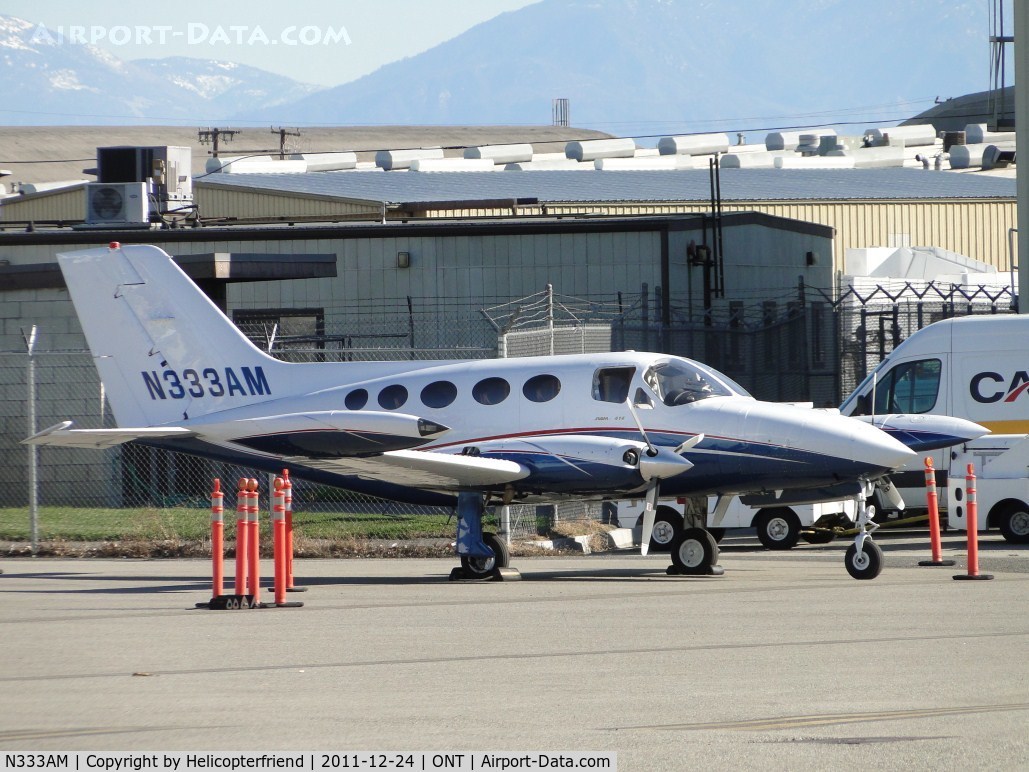 N333AM, 1975 Cessna 414 Chancellor C/N 414-0651, Parked behind the barricades