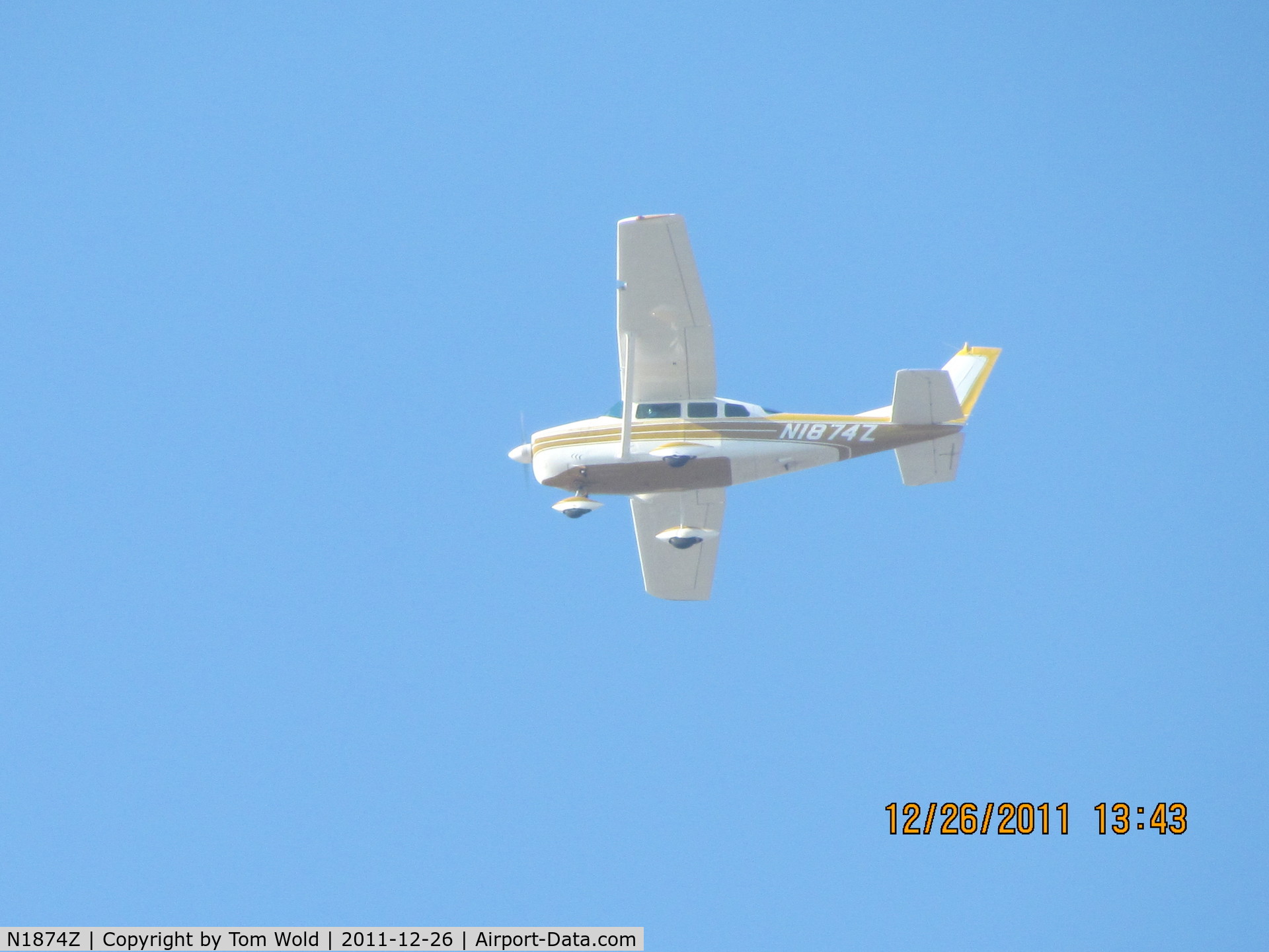 N1874Z, 1962 Cessna 210-5(205) C/N 2050074, Took this photo of N1874Z flying over the Arden Arcade area in Sacramento California.