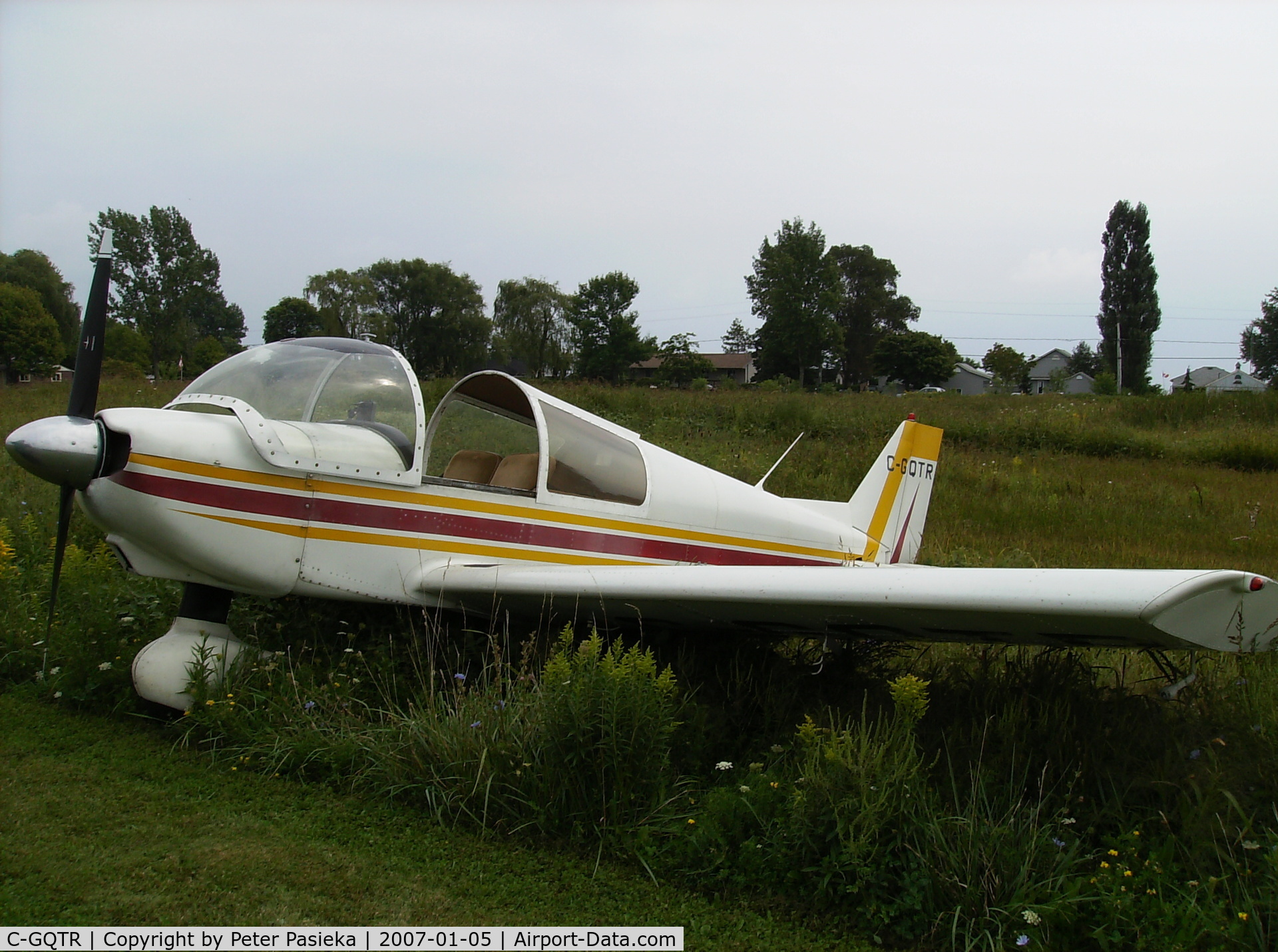 C-GQTR, 1977 Zenair CH-300 Tri-Z C/N 129, We pushed the airplane off the runway not to block it for others. This is a private field with the runway only about 1600 feet. Located not too far from the Mimico Power Plant