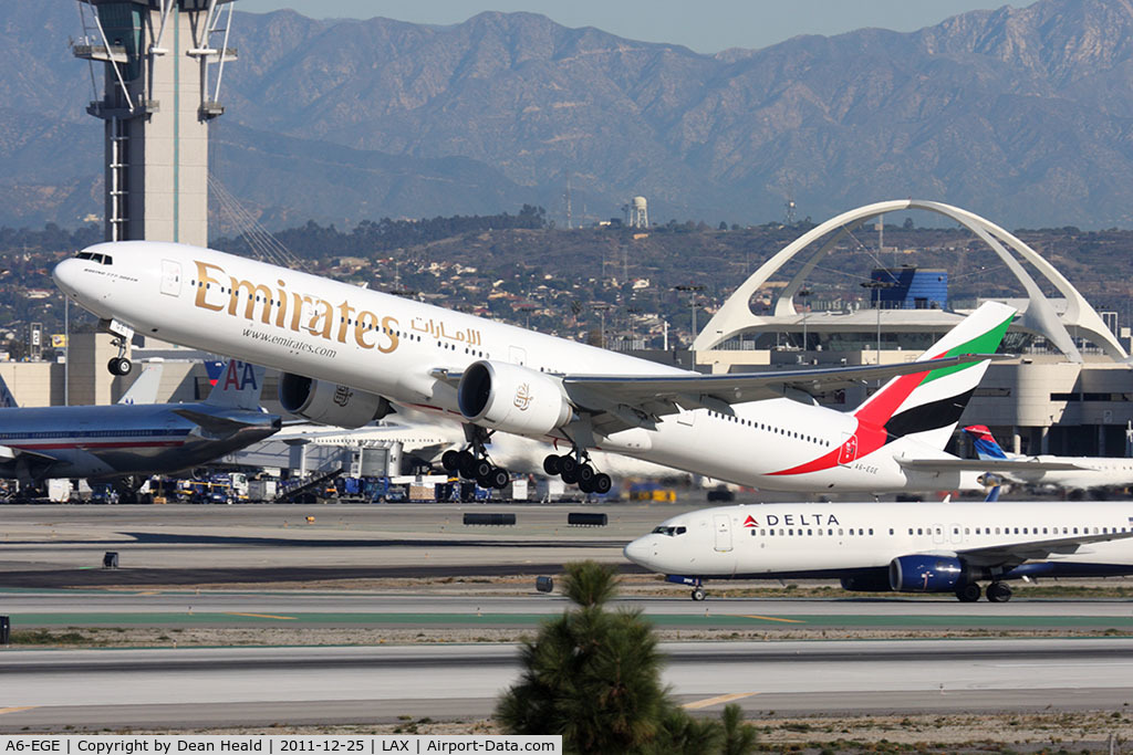 A6-EGE, 2011 Boeing 777-31H/ER C/N 35597, Emirates A6-EGE (FLT UAE218) departing RWY 25R en route to Dubai Int'l (OMDB/DXB).