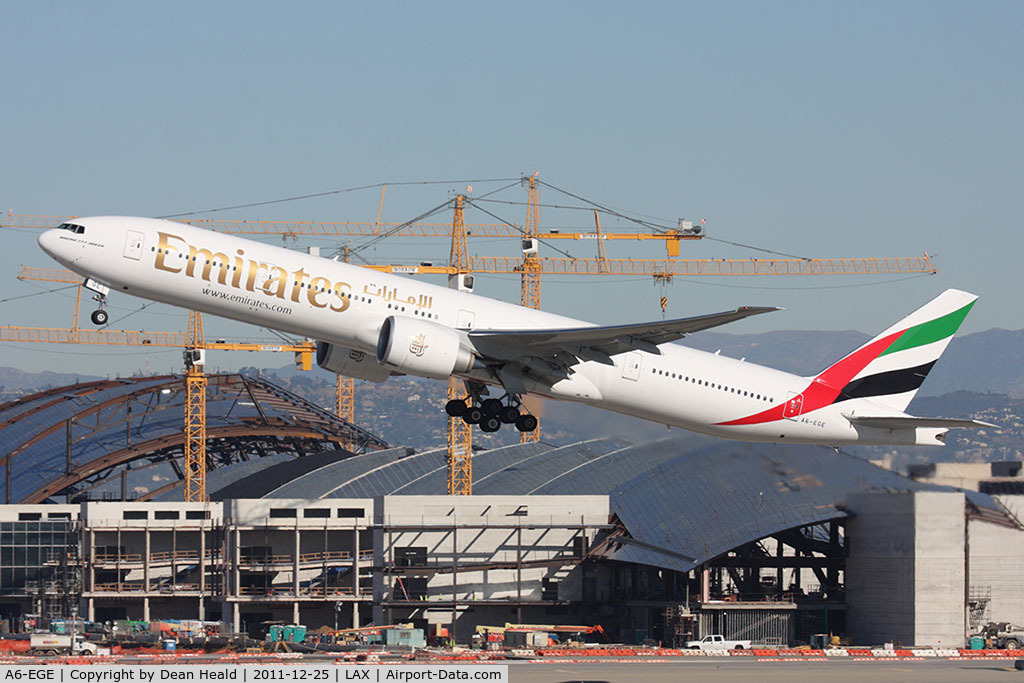 A6-EGE, 2011 Boeing 777-31H/ER C/N 35597, Emirates A6-EGE (FLT UAE218) departing RWY 25R en route to Dubai Int'l (OMDB/DXB).
