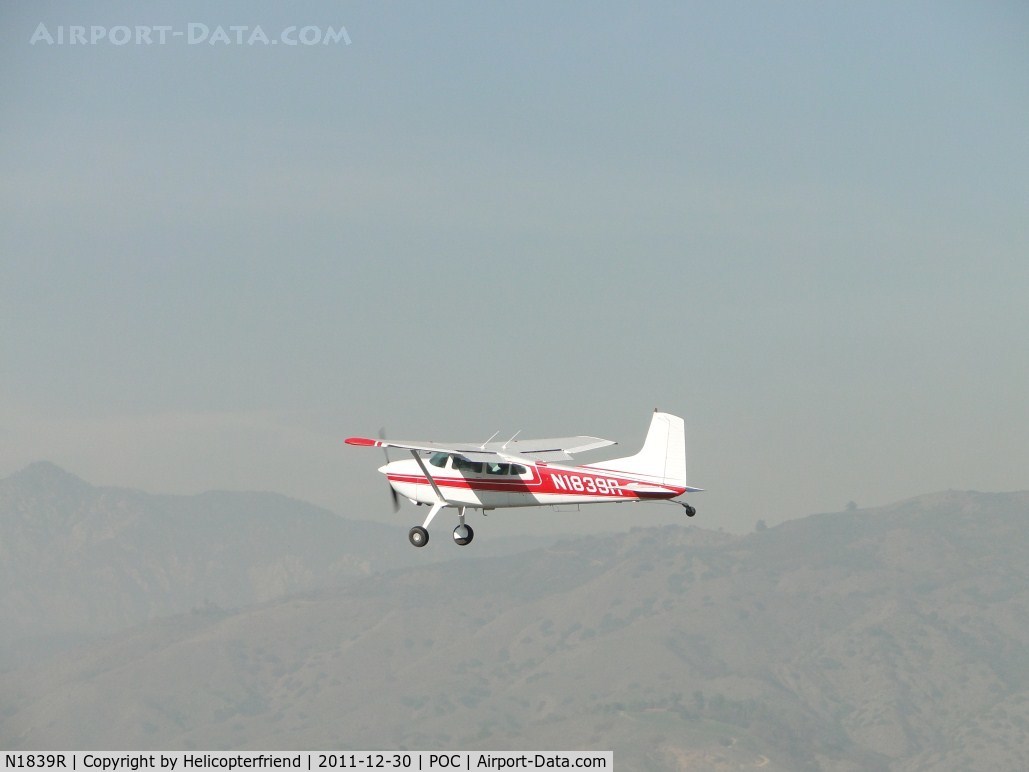 N1839R, 1974 Cessna A185F Skywagon 185 C/N 18502554, Climbing into the smoggy sky