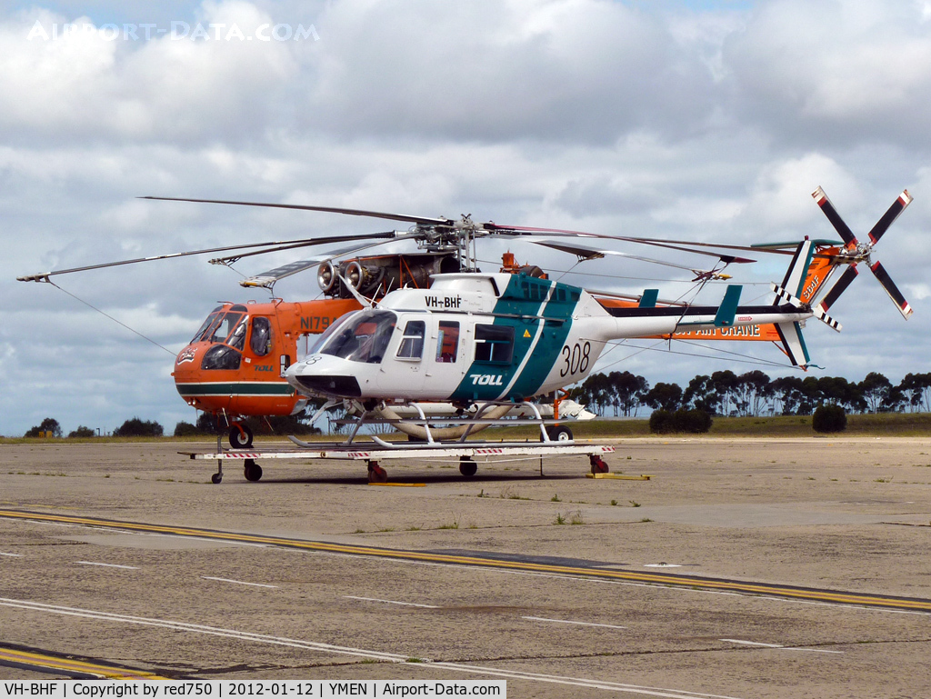 VH-BHF, 1979 Bell 206L-1 LongRanger II C/N 45164, VH-BHF on dolley in front of Sikorsky S64F N197AC, aerial firefighter 