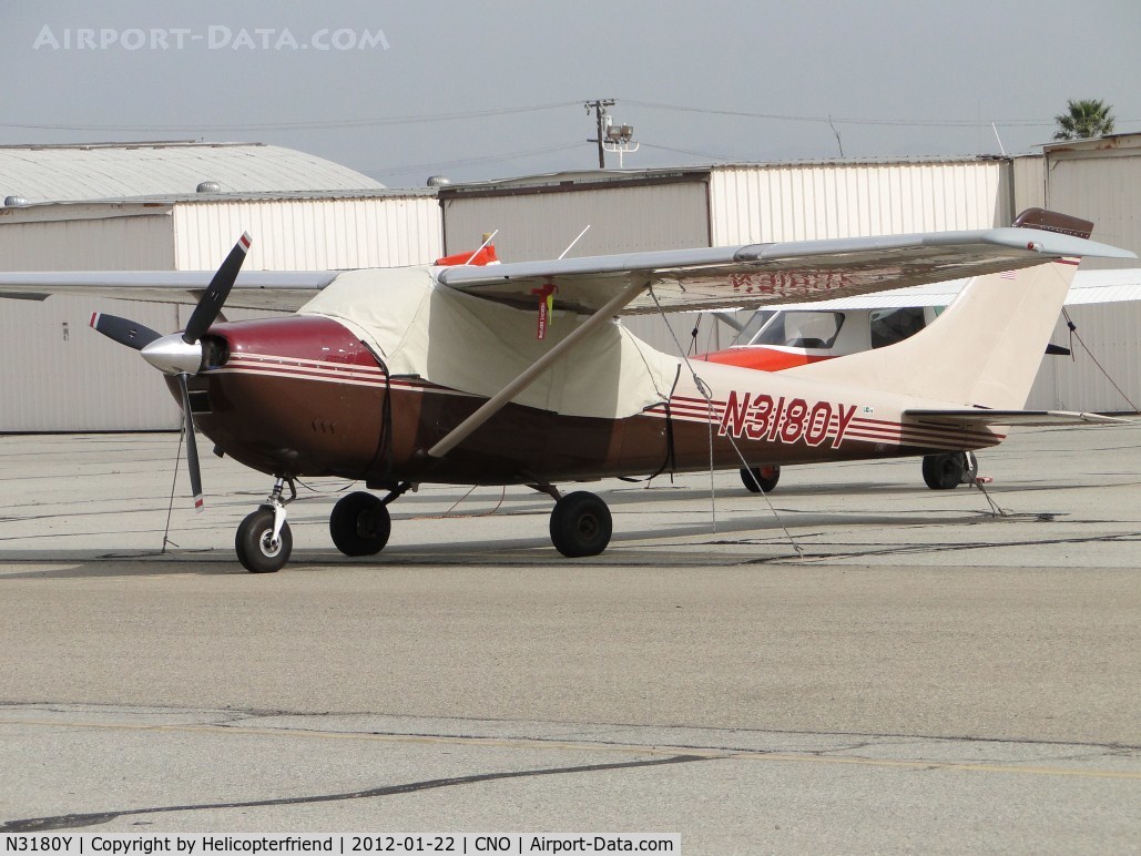 N3180Y, 1962 Cessna 182E Skylane C/N 18254180, Covered up, tied down and parked