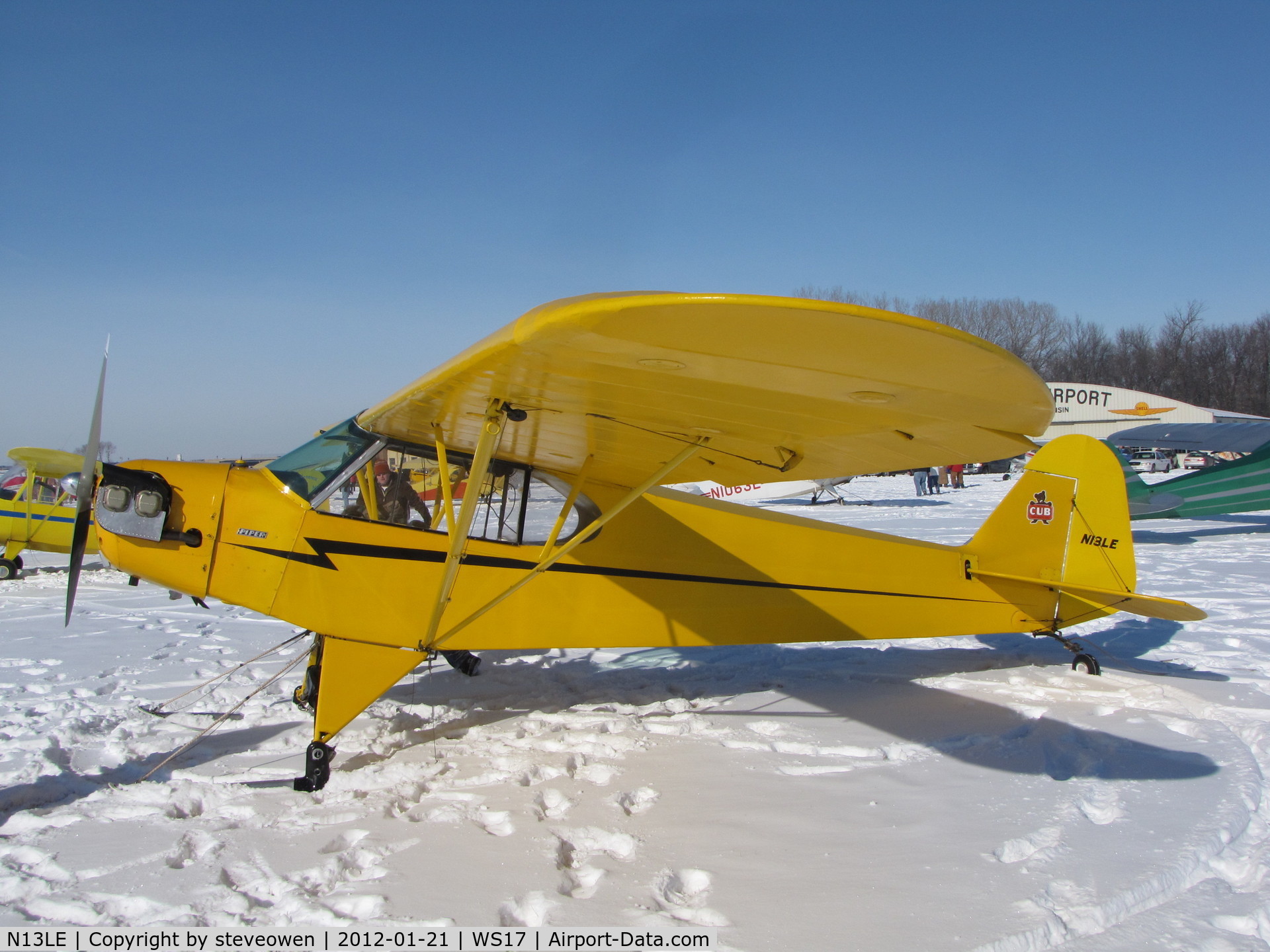 N13LE, Piper J3C-65 Cub Cub C/N 17571, Bright snow and skis make for a good day of fun