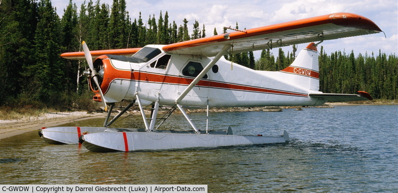 C-GWDW, 1953 De Havilland Canada U-6A Beaver C/N 306/1118, C-GWDW on shores of Wollaston Lake, SK in the early 80's. Wollaston Lake Air had it here for a number of years