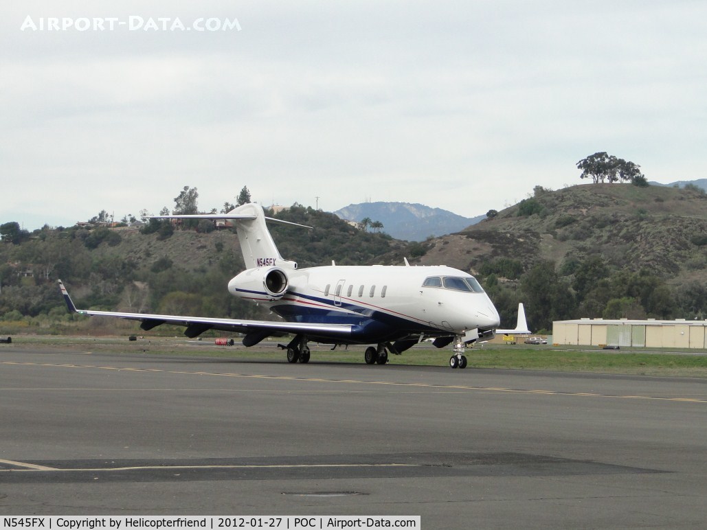 N545FX, 2010 Bombardier Challenger 300 (BD-100-1A10) C/N 20302, Entering taxiway Sierra heading for runway 26L