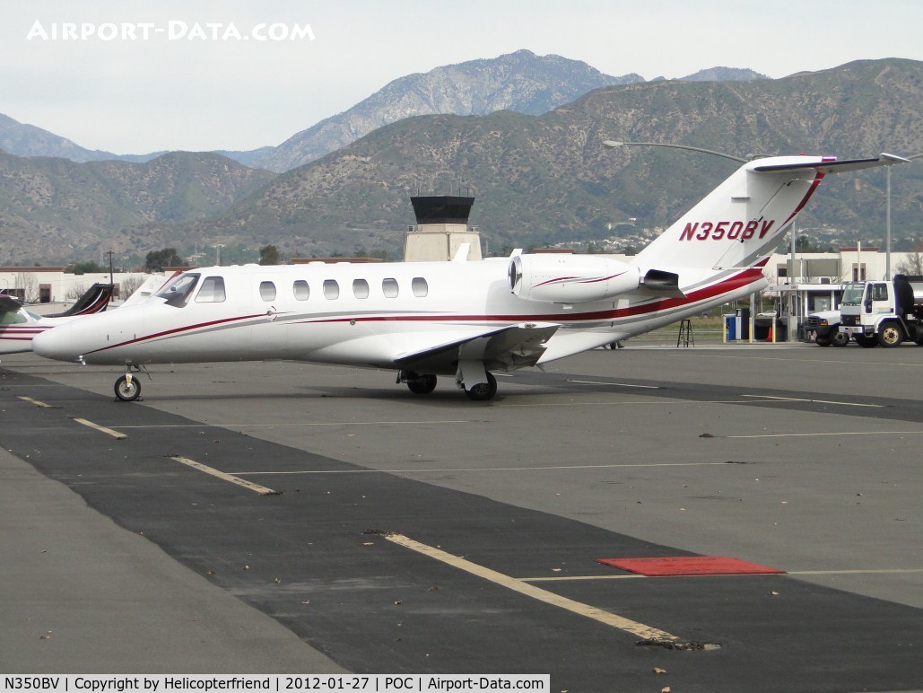 N350BV, 2003 Cessna 525A CitationJet CJ2 C/N 525A0186, Parked in transient parking, red carpet from N545FX still on the tarmack