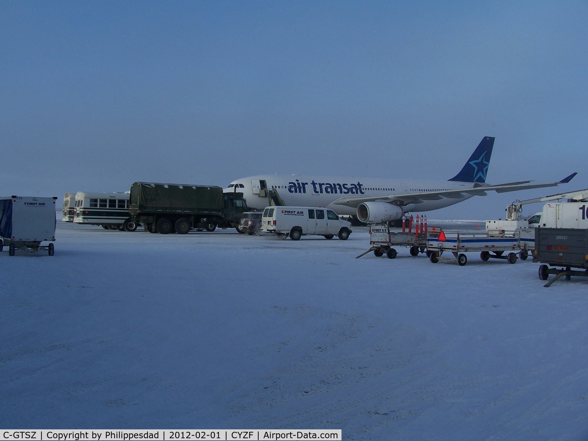 C-GTSZ, 2008 Airbus A330-243 C/N 971, Air Transat A330 at Yellowknife 2012 Feb 01 appears to be deployed by Canadian Armed Forces to deliver personnel for winter exercises.