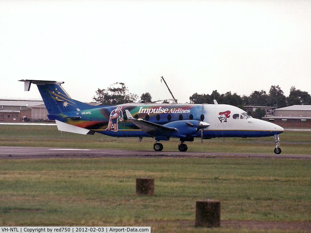 VH-NTL, 1994 Beech 1900D C/N UE-117, Photograph by Edwin van Opstal with permission. Scanned from a color print.