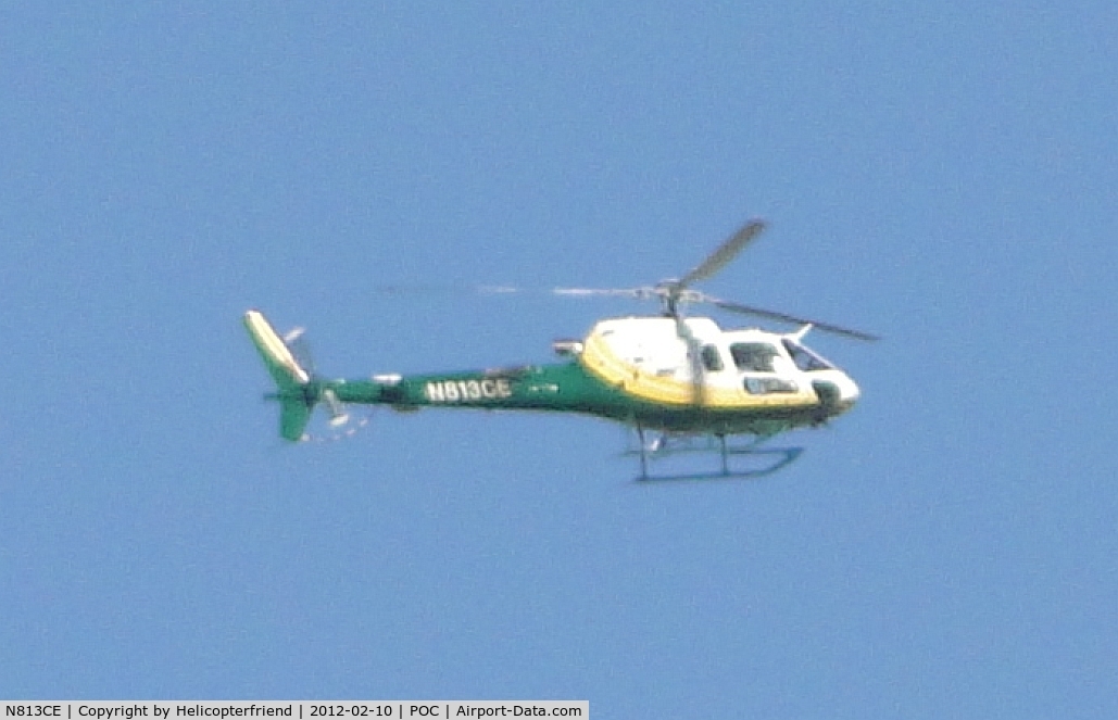 N813CE, 2004 Eurocopter AS-350B-3 Ecureuil Ecureuil C/N 3830, With permission, passing through the area of final approach to runway 26, approximately 1 mile east at 2500 feet