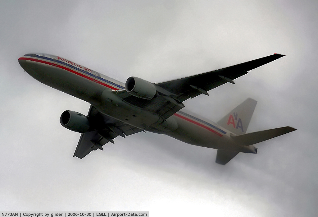 N773AN, 1999 Boeing 777-223 C/N 29583, On finals to LHR and carving a dark path thro' the low cloud!!