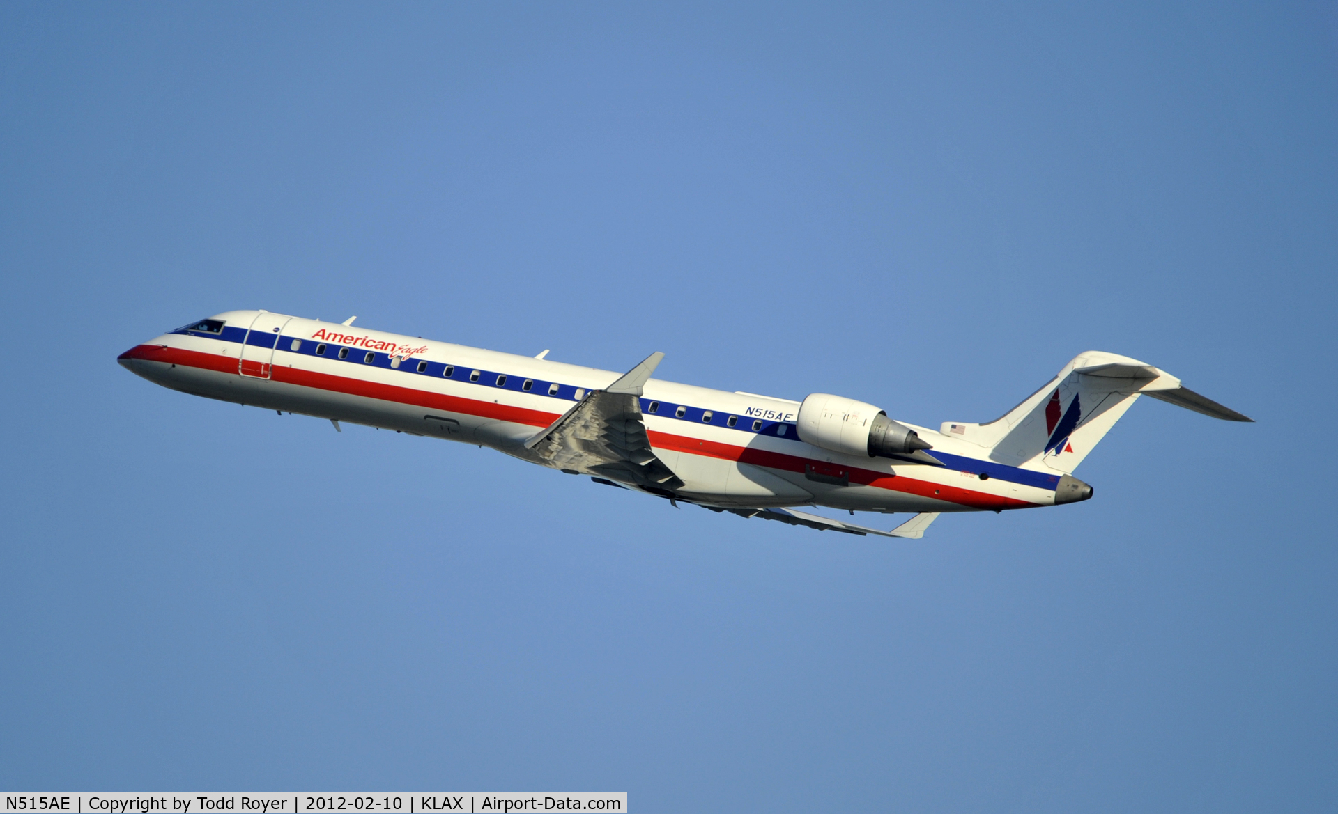 N515AE, 2003 Bombardier CRJ-701ER (CL-600-2C10) Regional Jet C/N 10121, Departing LAX on 25R