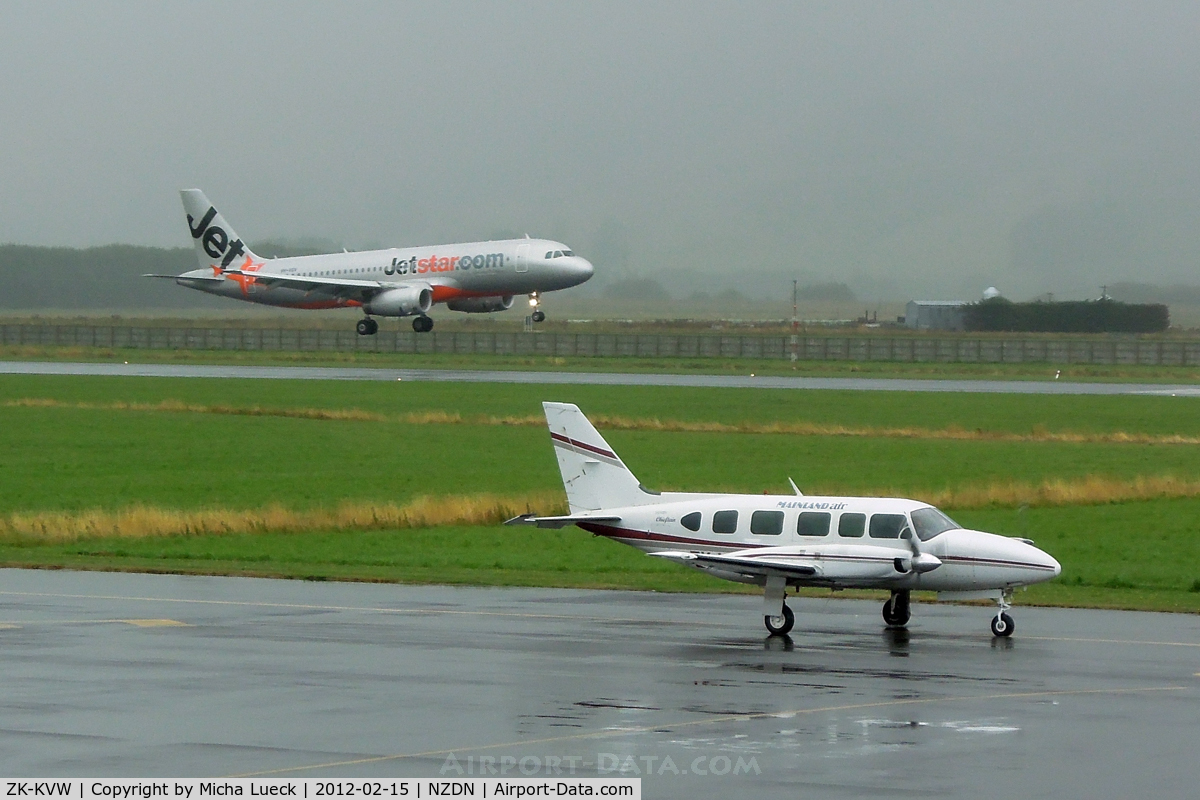ZK-KVW, Piper PA-31-350 Chieftain C/N 31-7752004, VH-VGV in the back on this gloomy morning