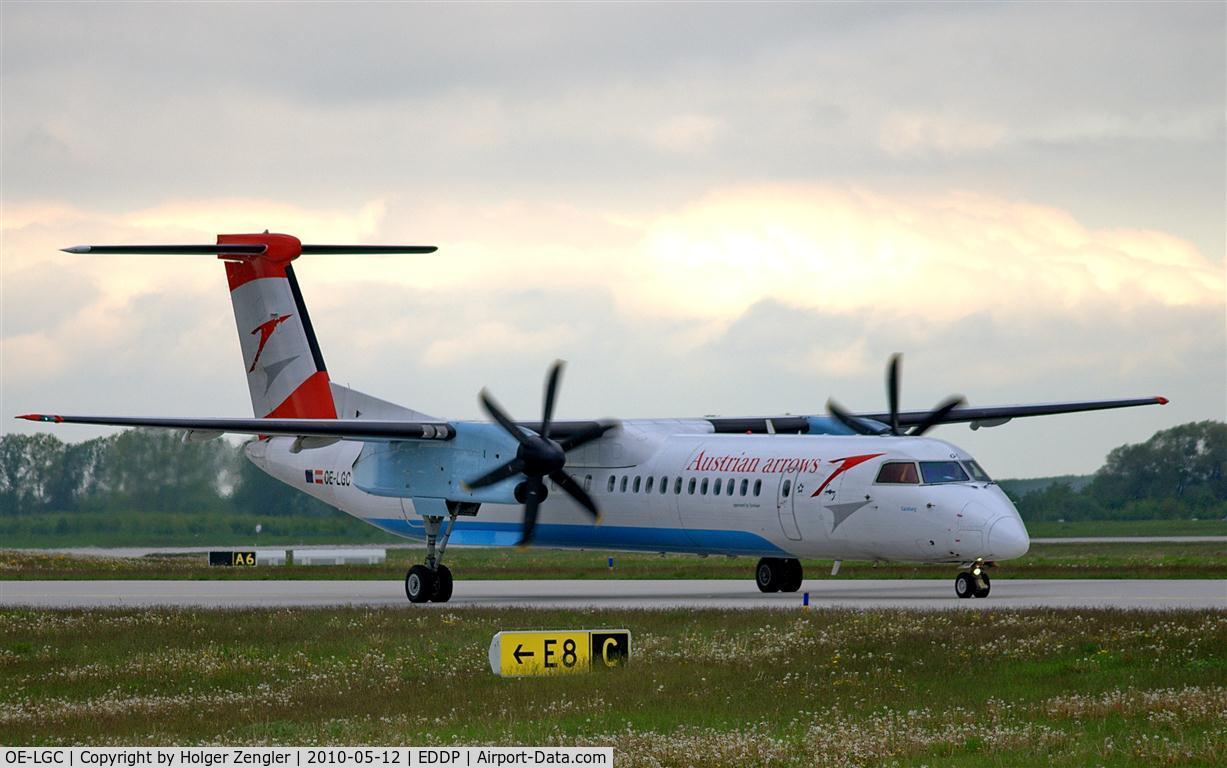 OE-LGC, 2000 De Havilland Canada DHC-8-402Q Dash 8 C/N 4026, On taxi to rwy 26R, expecting a 