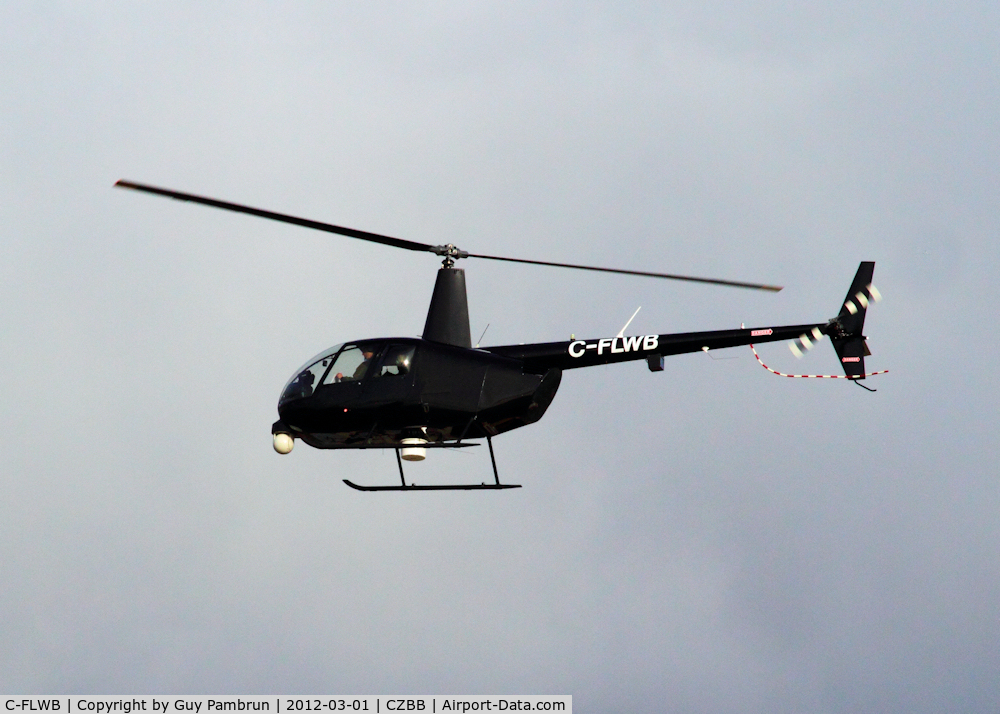 C-FLWB, 2006 Robinson R44 II C/N 11053, Leaving the airport