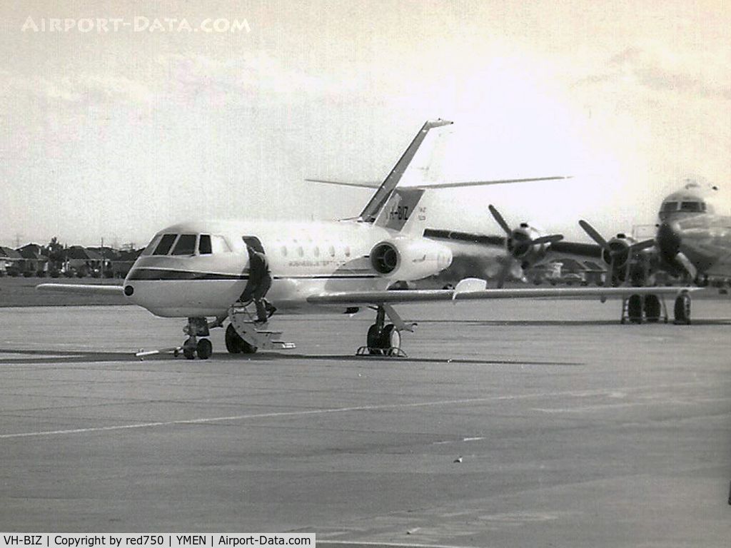 VH-BIZ, 1967 Dassault Falcon 20CC C/N 073, This image was scanned from a b&w print taken some time in the early 1960's at Essendon. This was the first business jet in Australia and the only example of the Falcon 20CC built, with dual wheels and low pressure tyres for use on unimproved strips.