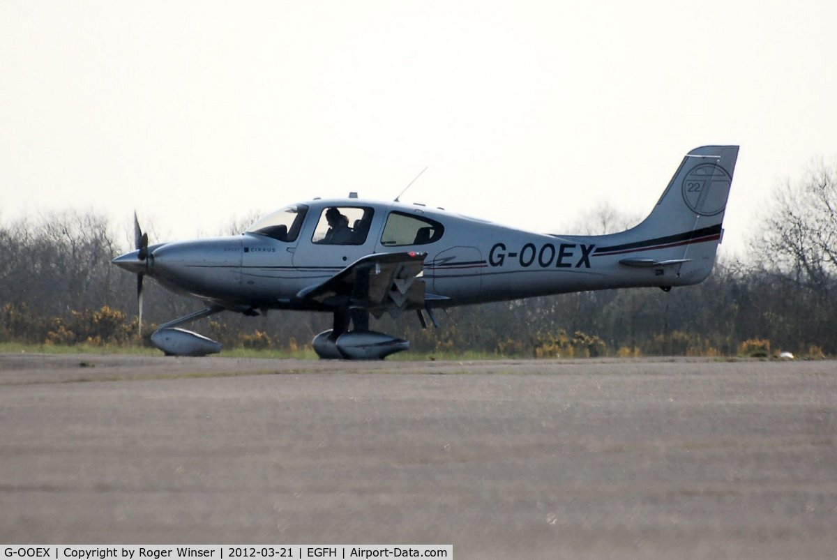 G-OOEX, 2010 Cirrus SR22T C/N 0010, Visiting SR-22T taxying prior to departure.